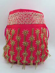 Golden Tubelight Fuchsia Handbag With Peal Beaded Embellishment