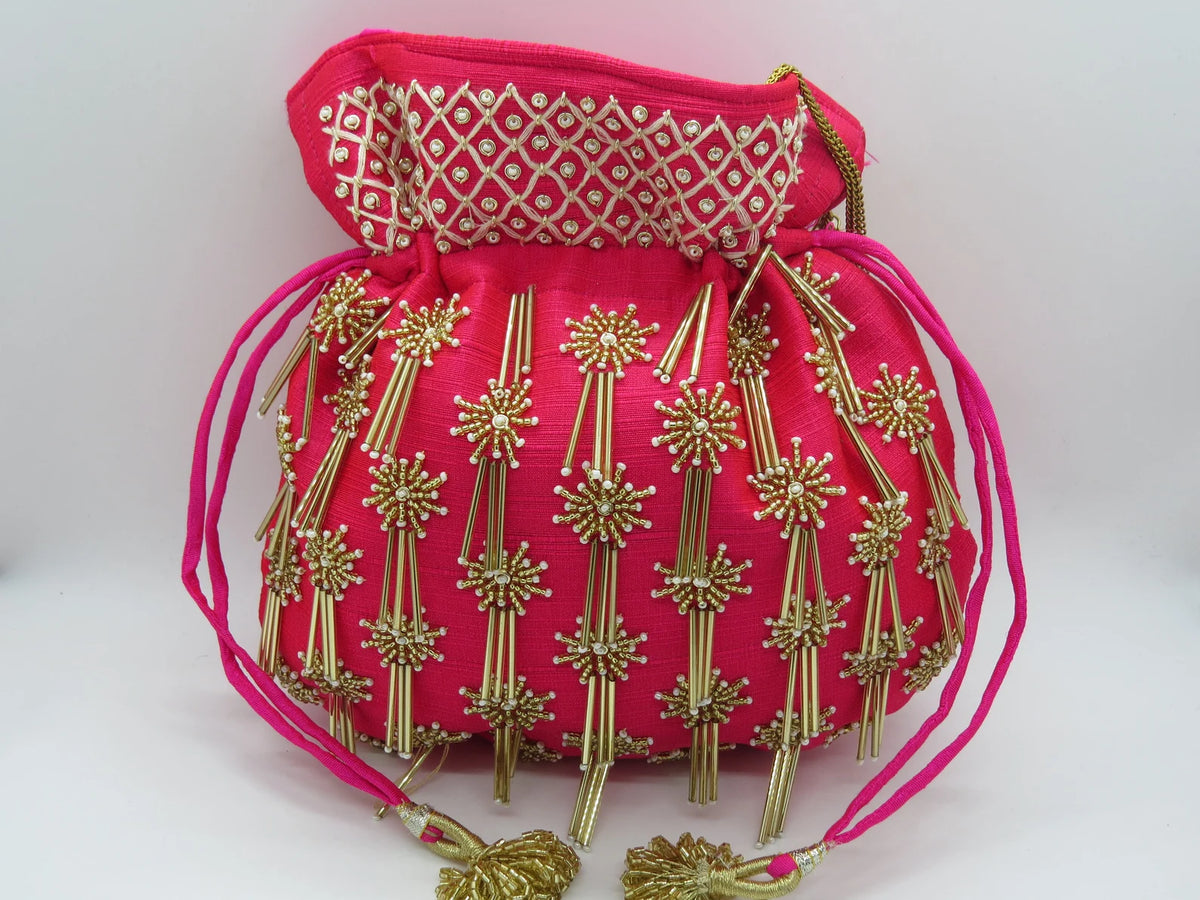 Golden Tubelight Fuchsia Handbag With Peal Beaded Embellishment