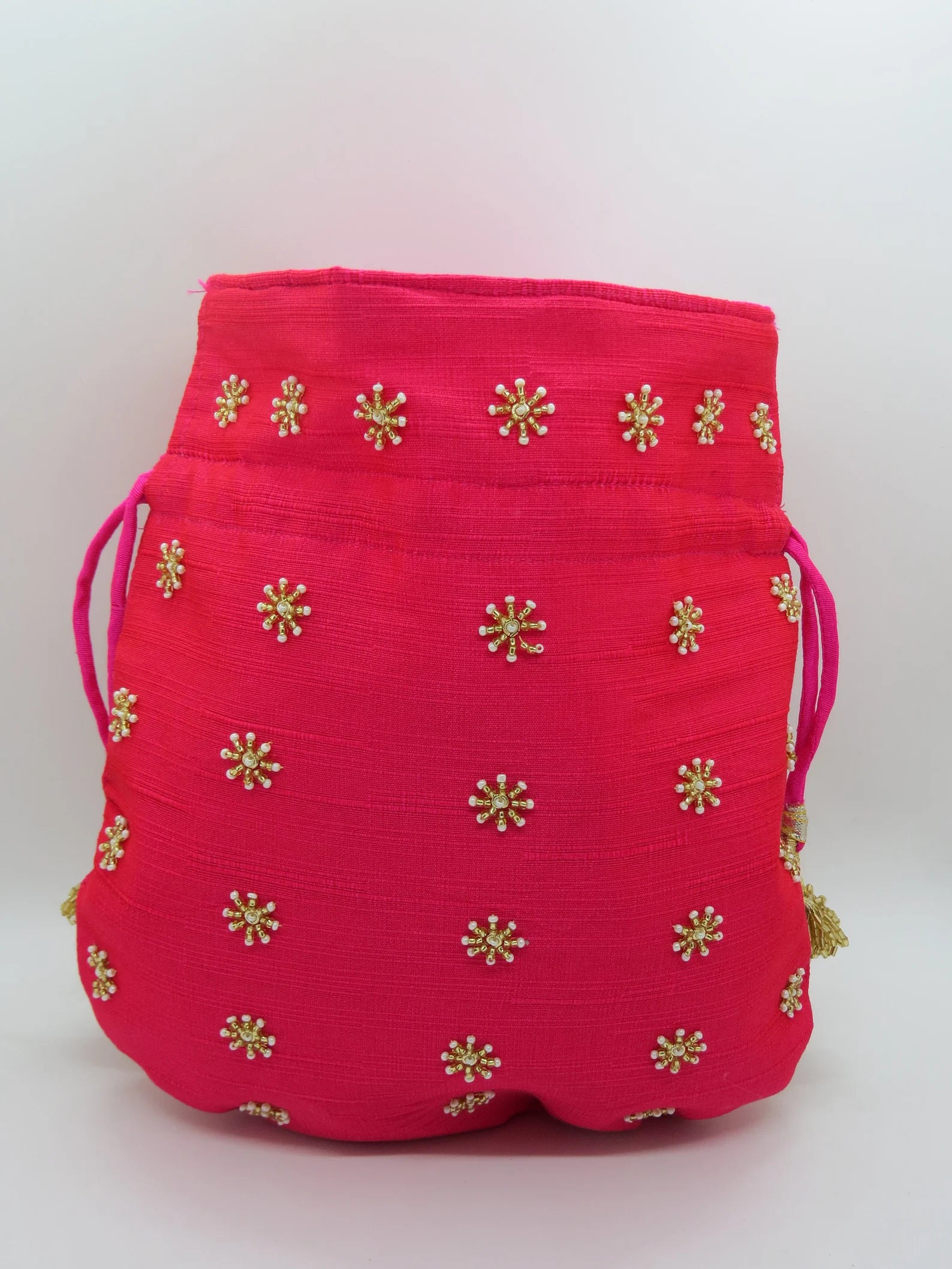 Golden Tubelight Fuchsia Handbag With Peal Beaded Embellishment