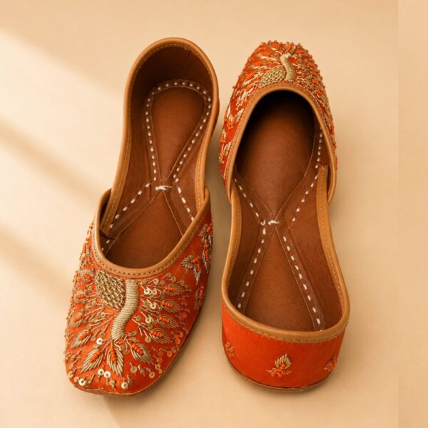 Rust Orange Leather Juttis with Traditional Gold Embroidery & Sequin Work
