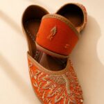 Rust Orange Leather Juttis with Traditional Gold Embroidery & Sequin Work