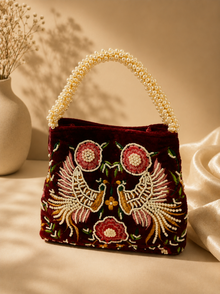 Maroon Velvet Embroidered Pearl Handle Handbag with Floral & Peacock Design